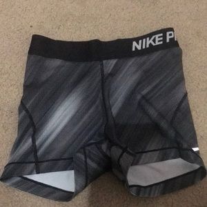 I am selling some beautiful grey dotted nike pros hardly ever worn!!